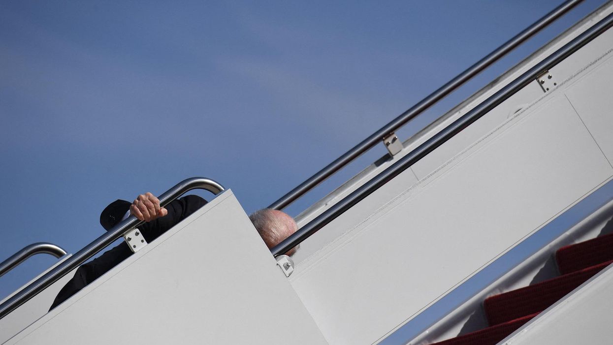 Biden stumbles multiple times and falls climbing Air Force One stairs — White House blames wind