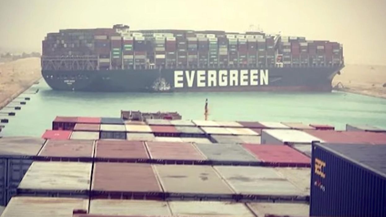 Massive cargo ship gets wedged in Suez Canal and brings one of the busiest shipping lanes in the world to a standstill