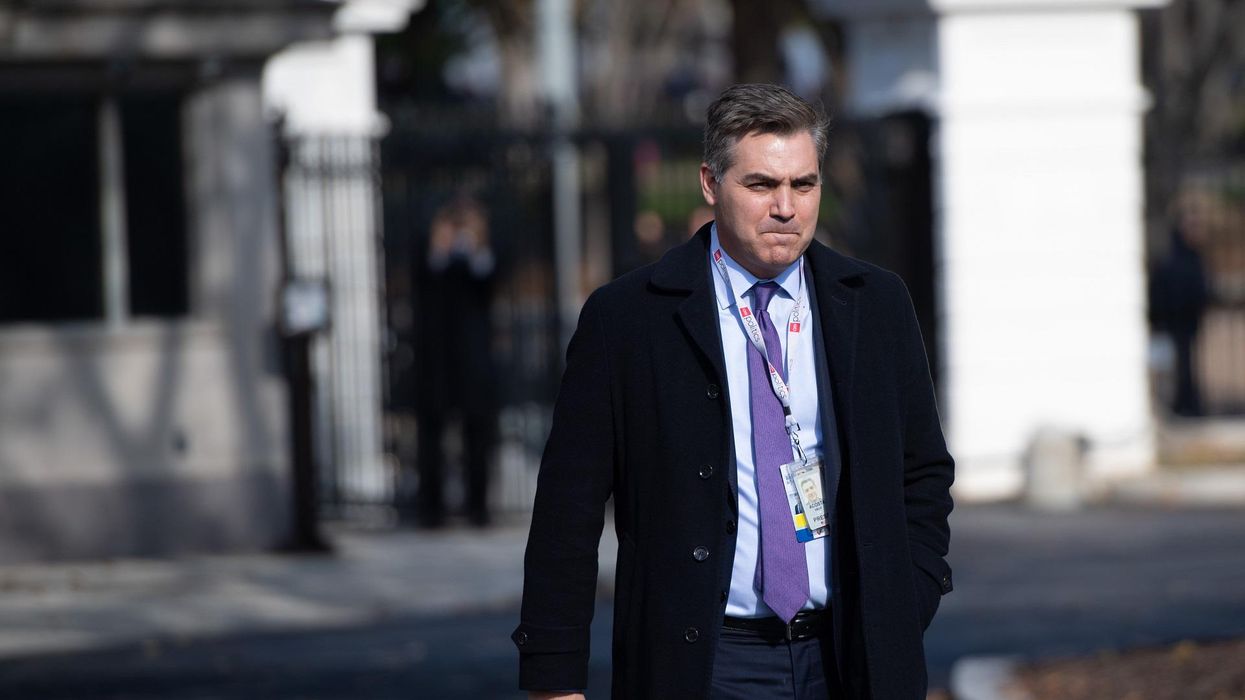 CNN's Jim Acosta roasted online for wearing self-promoting shirt during COVID-19 vaccine pic