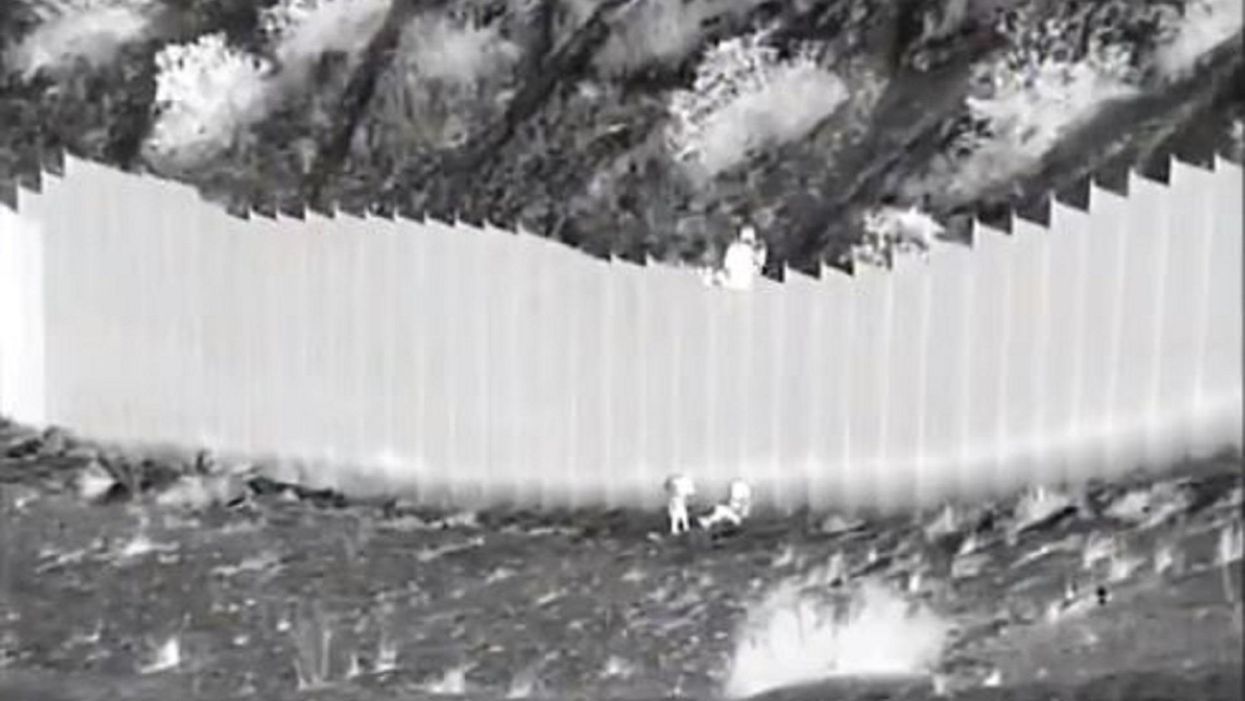 Border Patrol video shows smugglers dropping 3-year-old and 5-year-old girls from 14-foot wall