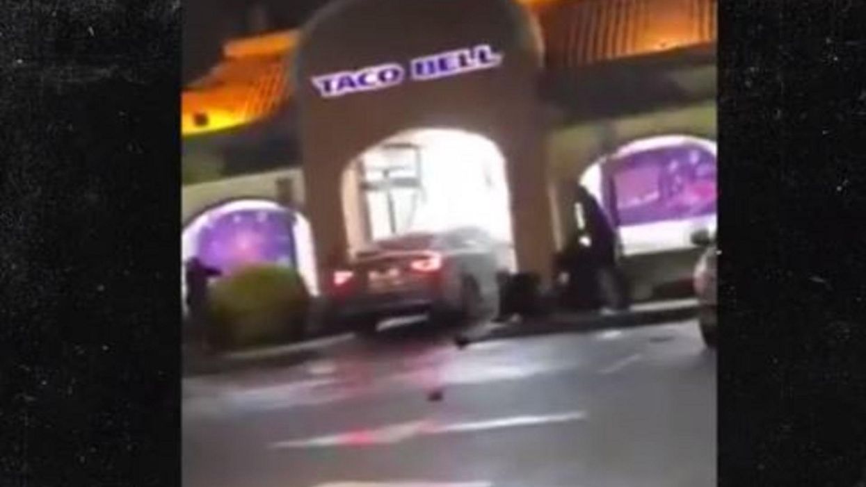 Watch: Driver plows through group of people and into a Taco Bell, injuring three