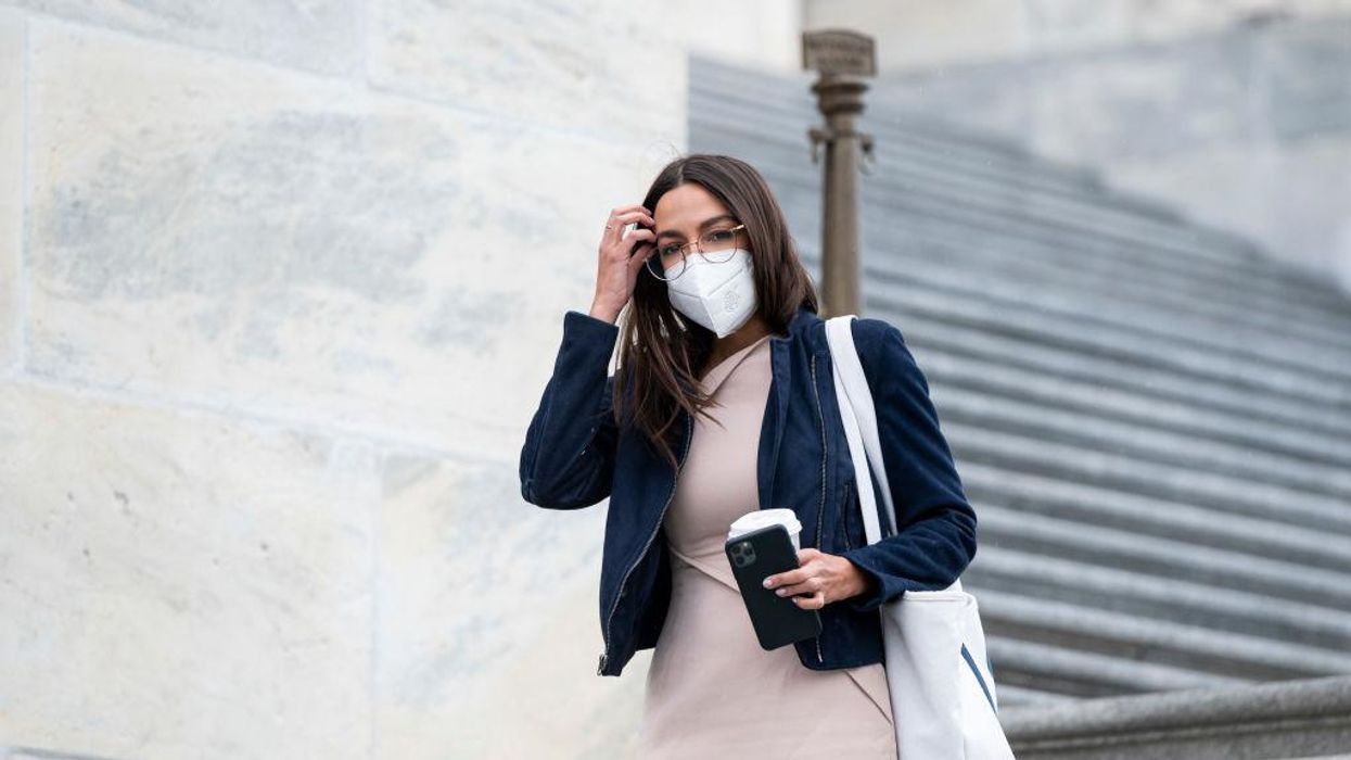 Capitol Police send cops to podcaster's home because someone else replied to his tweet with a threat toward AOC