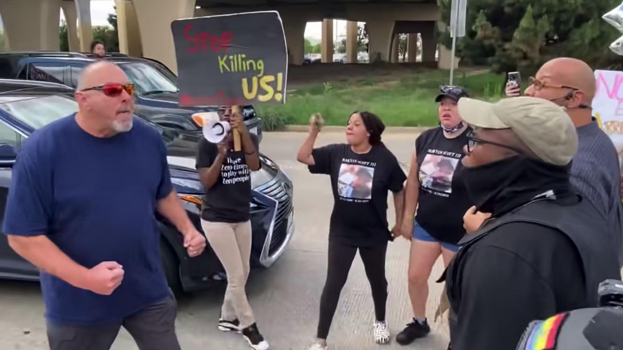 VIDEO: Angry motorist confronts BLM protesters blocking busy intersection as police officer does nothing