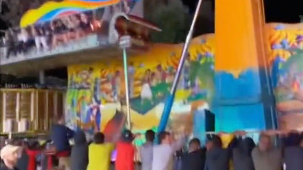 Terrifying video shows tragedy narrowly avoided when carnival ride spins out of control; festival-goers save the day
