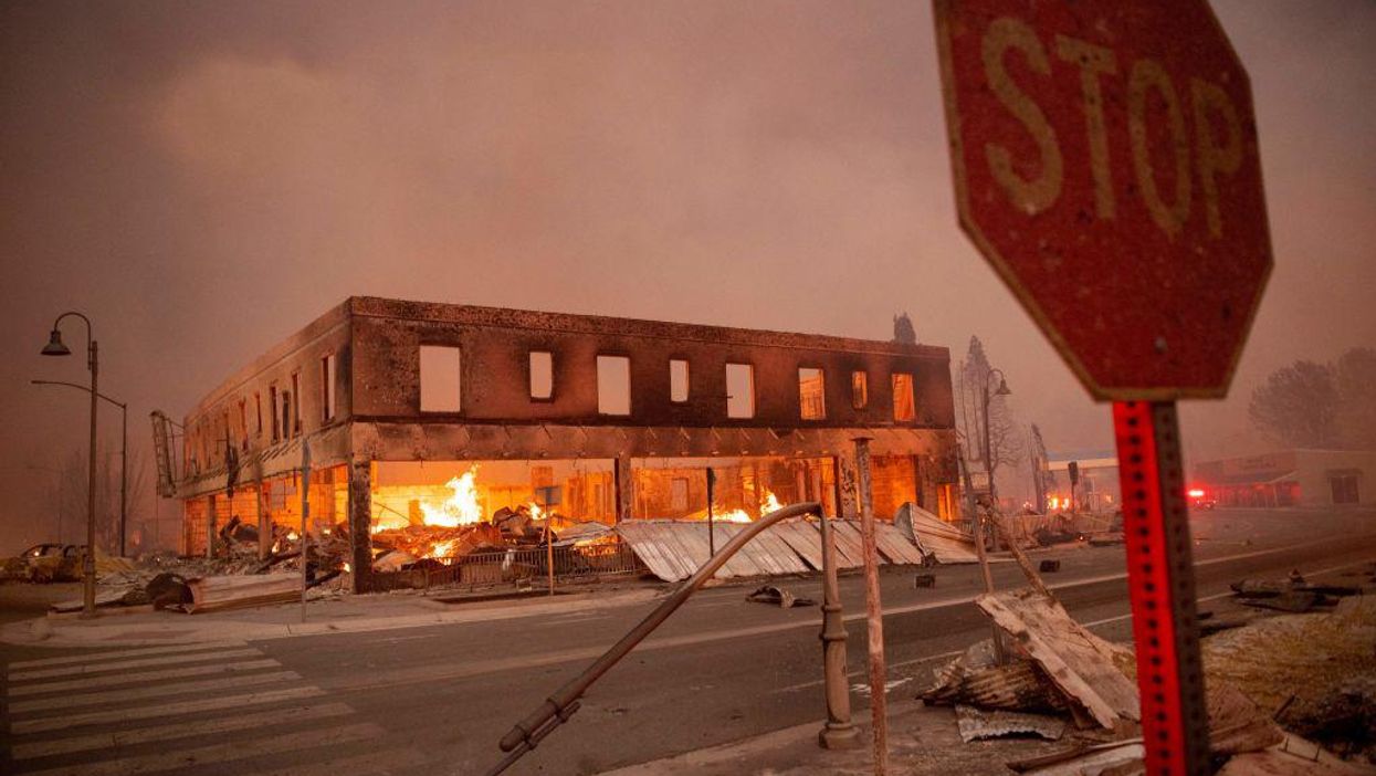 Hundreds of buildings destroyed by the biggest single wildfire ever recorded in California