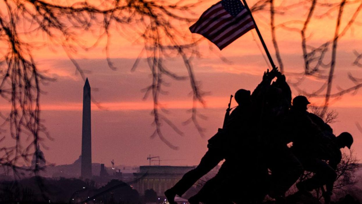 Taliban fighters wearing US gear mock iconic WWII image of Marines raising American flag on Iwo Jima: 'The humiliation continues'