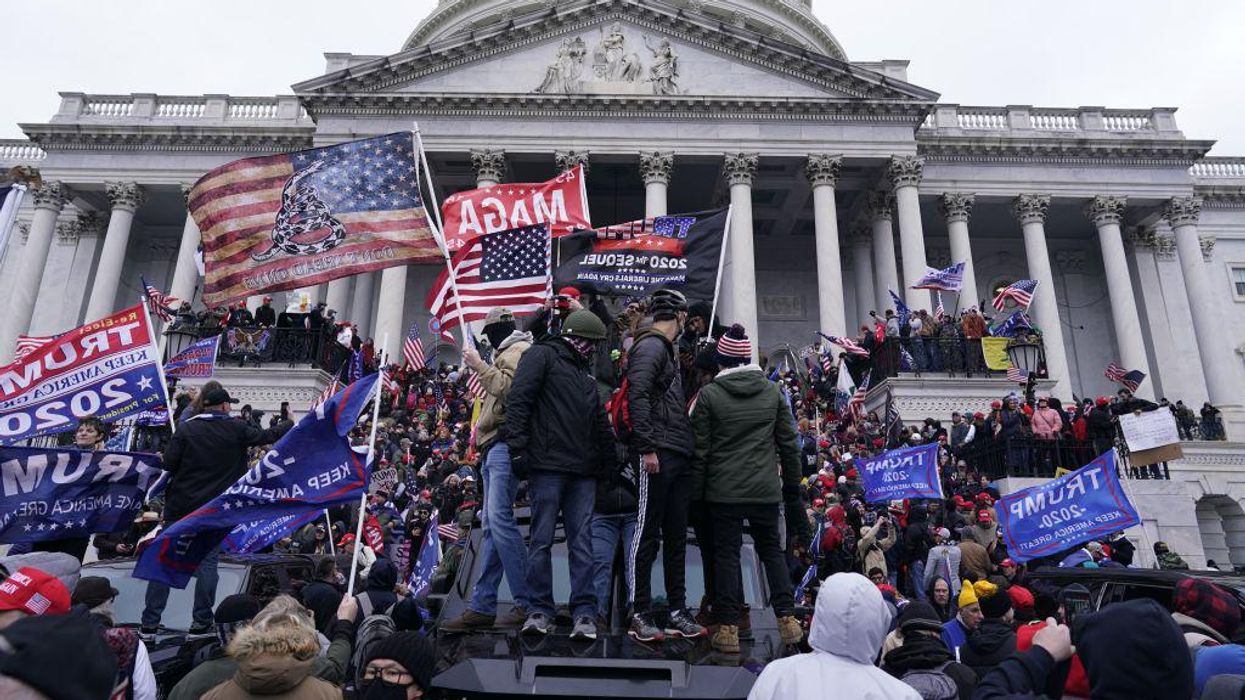 FBI reportedly had informant in Capitol riot crowd; insider says Proud Boys had no plans to engage in violence or storm the building on Jan. 6