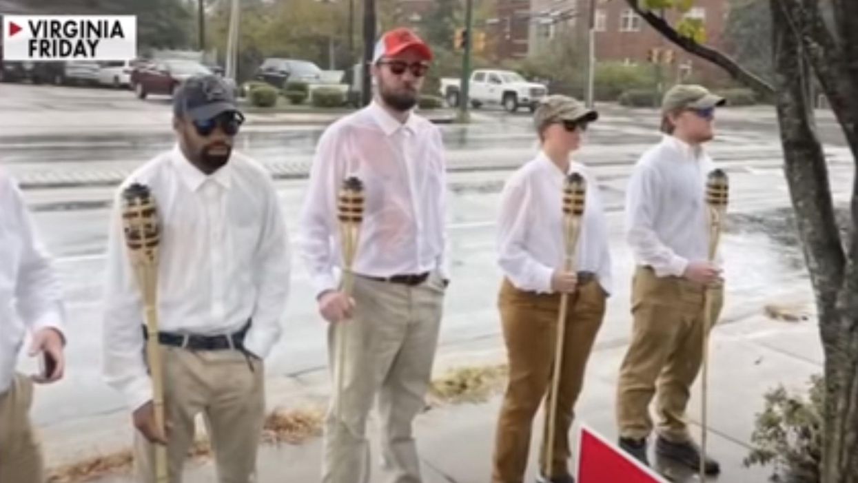 Liberal organizers of tiki torch stunt deny it was meant to be a race hoax, but reporter contradicts key fact