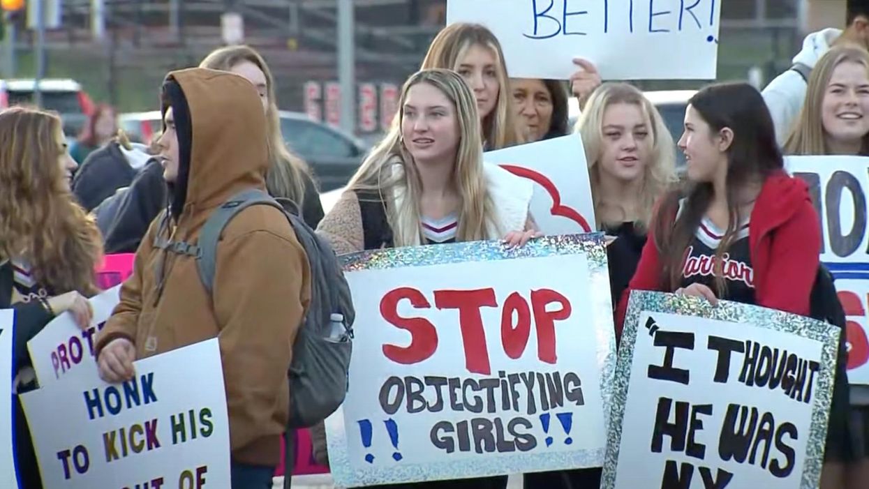 Parents protest after student who posted 'up-skirt' photos of female schoolmates is allowed to return to class