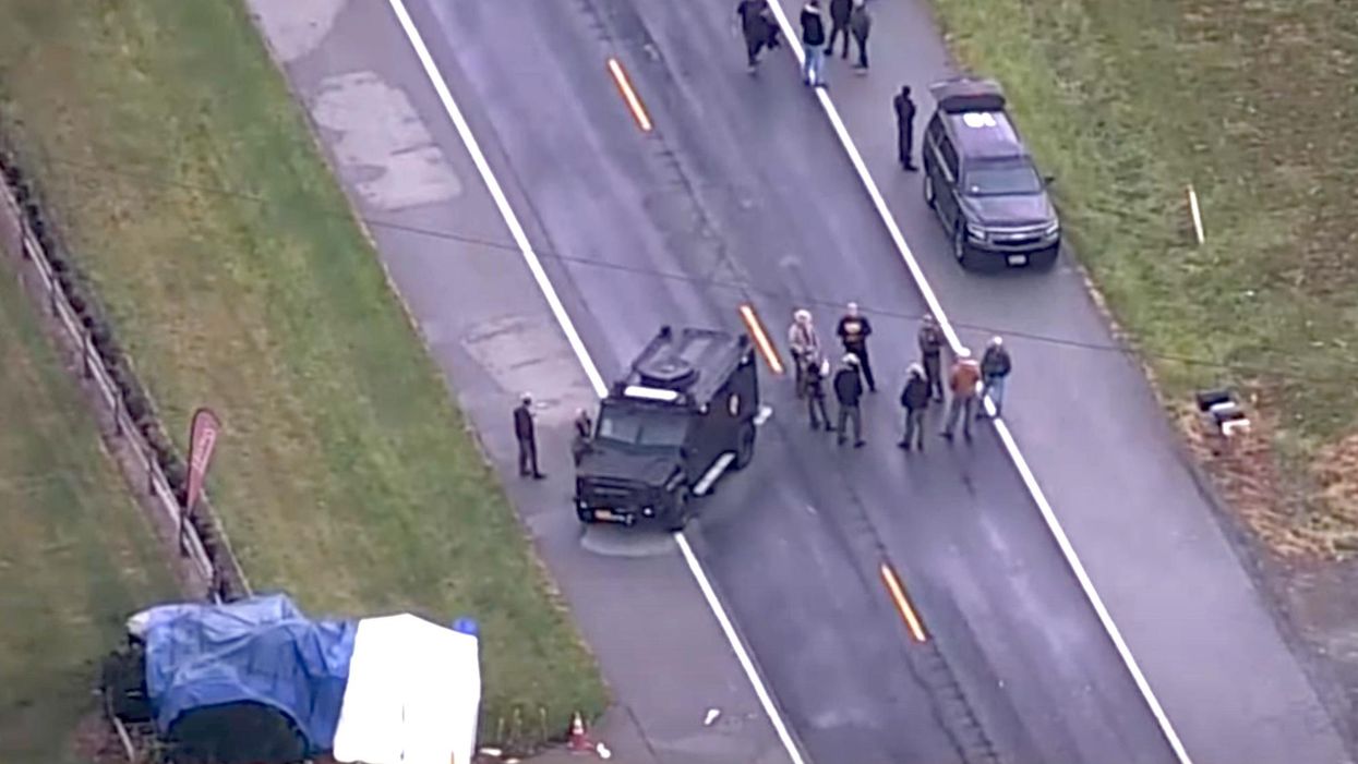 Former officer found shot dead alongside the daughters he allegedly abducted, police say