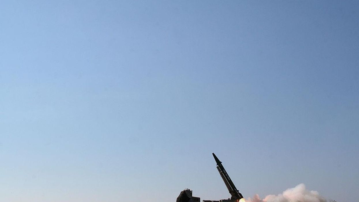 Iran launches over a dozen ballistic missiles as a 'warning' to Israel