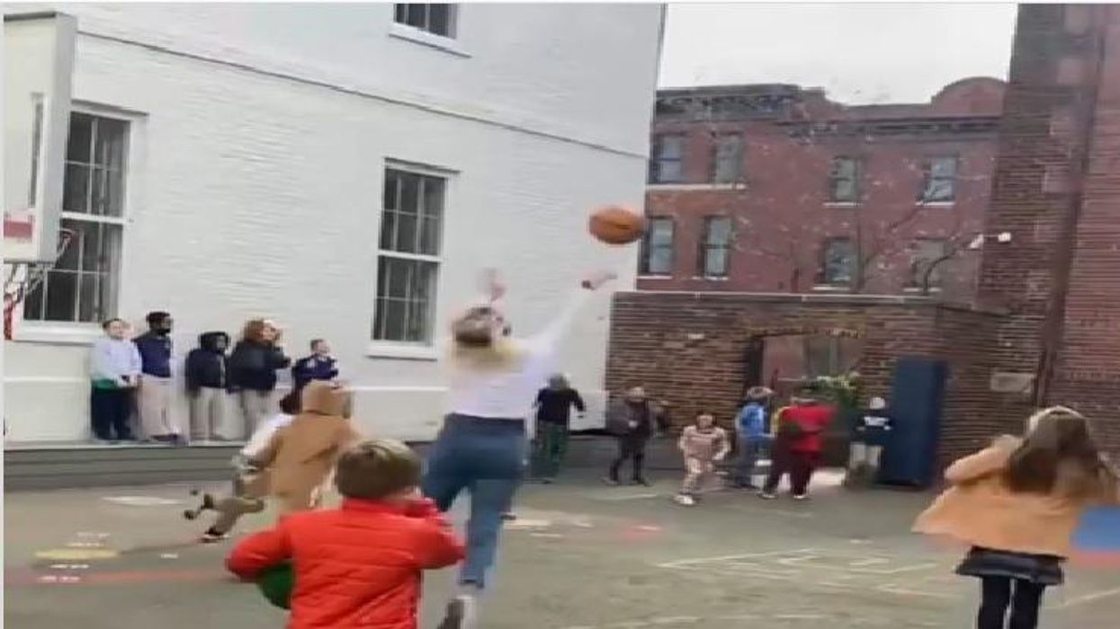 Heartwarming viral video shows third grade teacher hit 'Hail Mary' shot to win her class hot chocolate