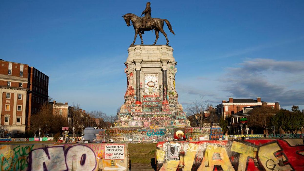 Workers find time capsule inside base of Robert E. Lee statue. Historians believe it could be the 1887 box they've been looking for.