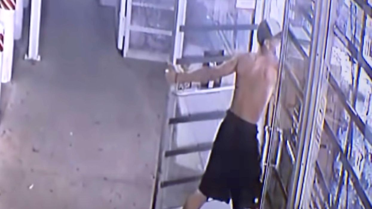 Shocking video captures a male sneaking up to a convenience store entrance before unloading his gun and killing three teenagers