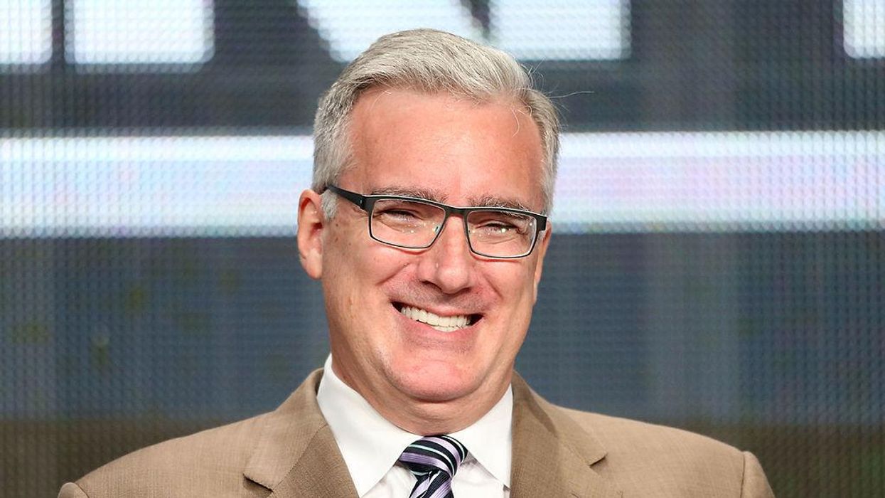 'Somebody gift these people some vasectomies,' Keith Olbermann says in response to Sen. Mitt Romney's family photo