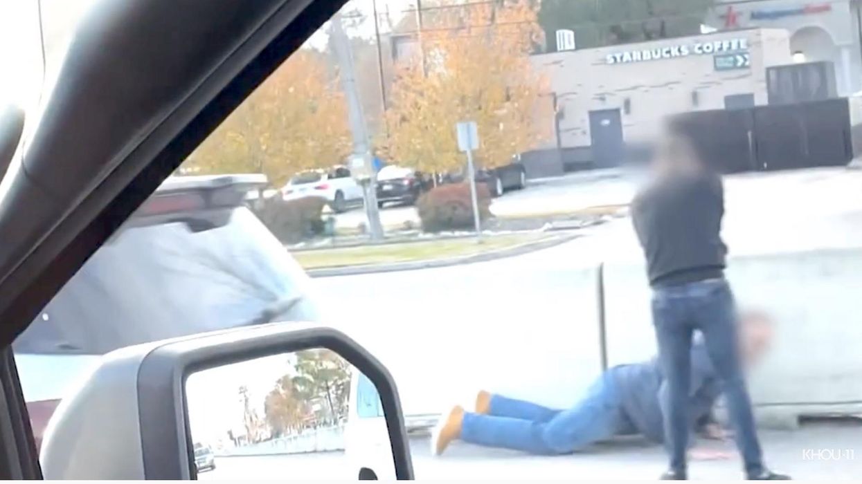 Shocking video shows attempted armed robbery where suspect accidentally shot himself in the head during a struggle