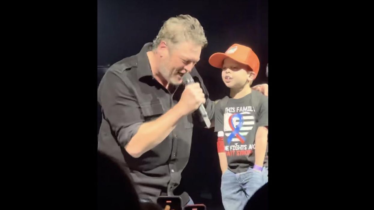Blake Shelton sees 6-year-old boy in crowd holding a sign. Turns out kid needs heart transplant — and Shelton invites him on stage to sing 'God's Country.'