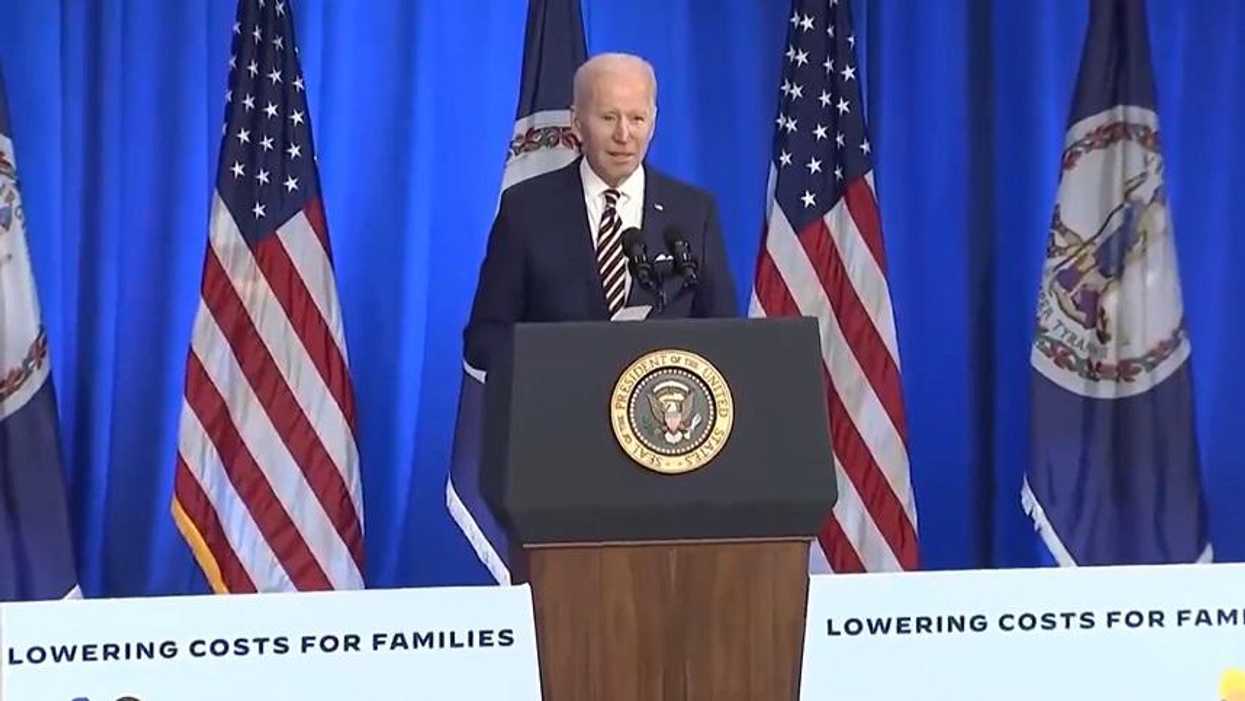 Biden roasted for tone-deaf speech on rising costs — while standing behind 'lowering costs for families' sign