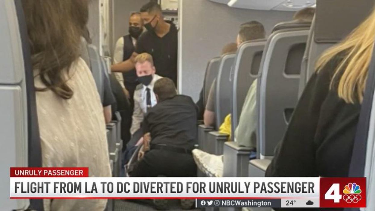 'Unruly' passenger tries to open aircraft door mid-flight, coffee pot wielding flight attendant takes him down