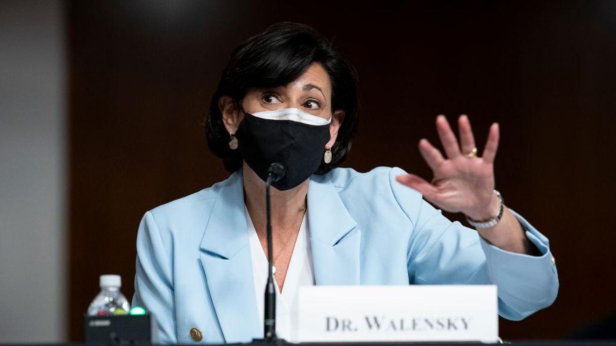CDC director says agency is reviewing mask guidance, but not changing recommendations yet