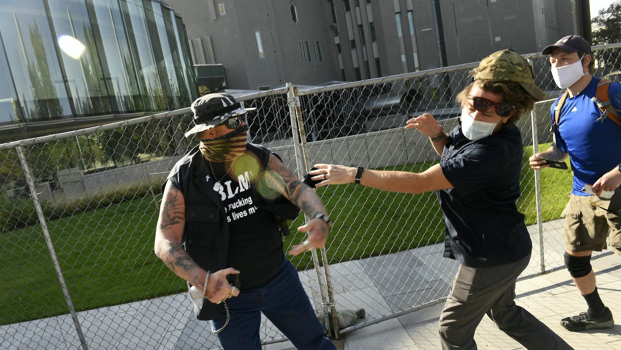 Prosecutors will drop murder charge against unlicensed security guard who shot and killed 'Patriot Rally' protester