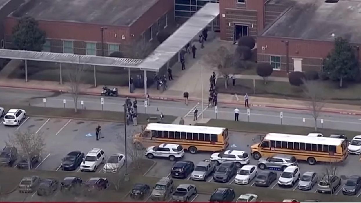 12-year-old dies from middle school shooting and police catch a suspect hiding under a nearby deck. The suspect is also 12 years old.