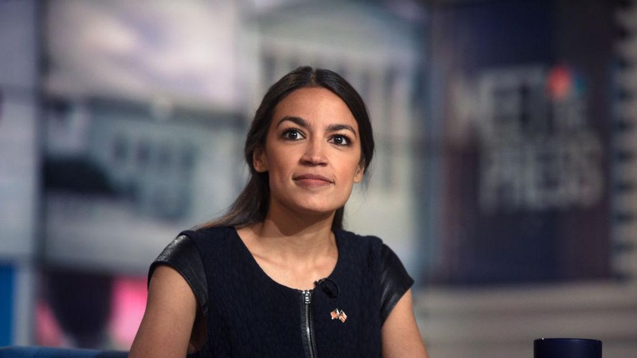 Rep. Alexandria Ocasio Cortez poses the question, 'How is it that the party who believes corporations are people are suddenly trying to police who is a woman and who isn’t?'