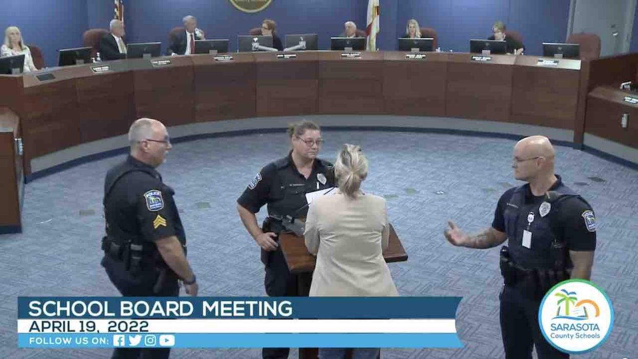 Cops converge upon mom at school board meeting after chairwoman kicks her out for 'something horrible' she was 'about to say' regarding board member