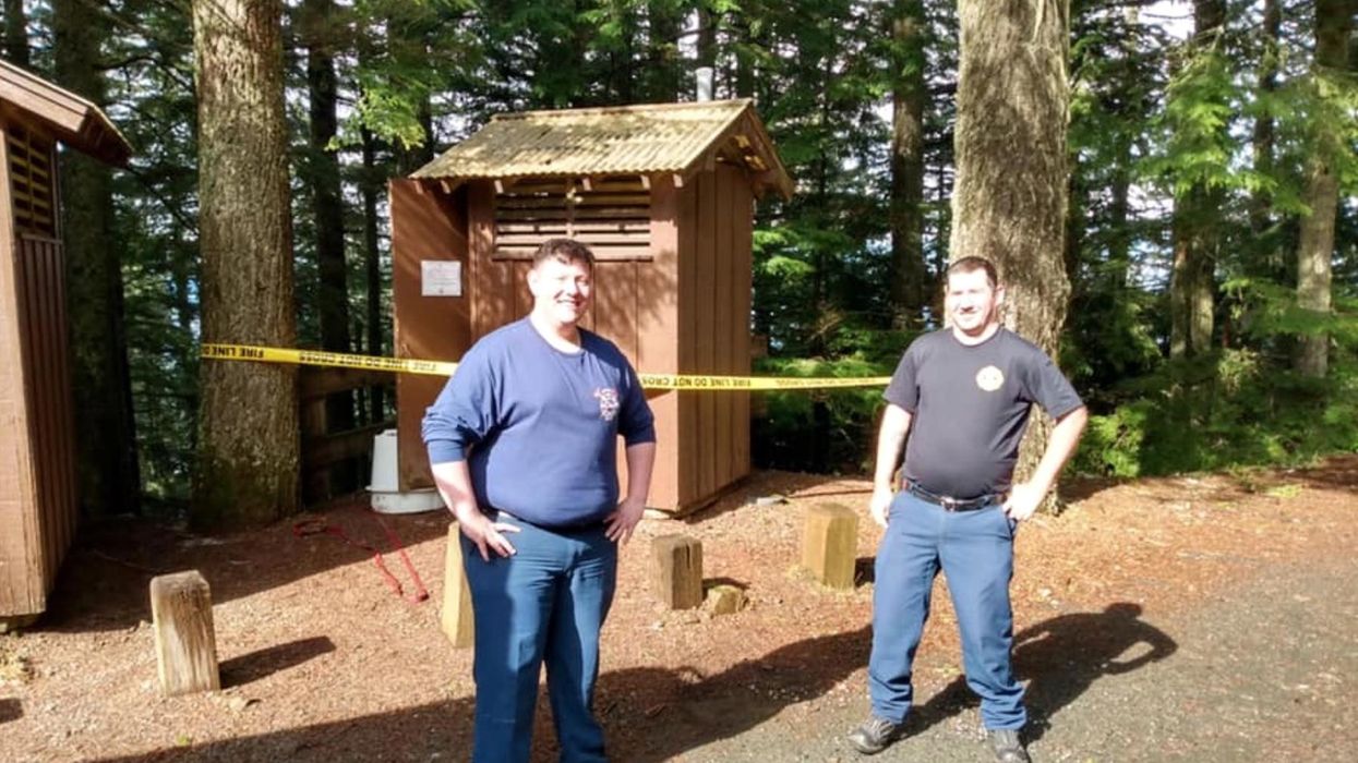 Woman falls headfirst into the toilet of an outhouse while trying to recover her cellphone with a dog leash