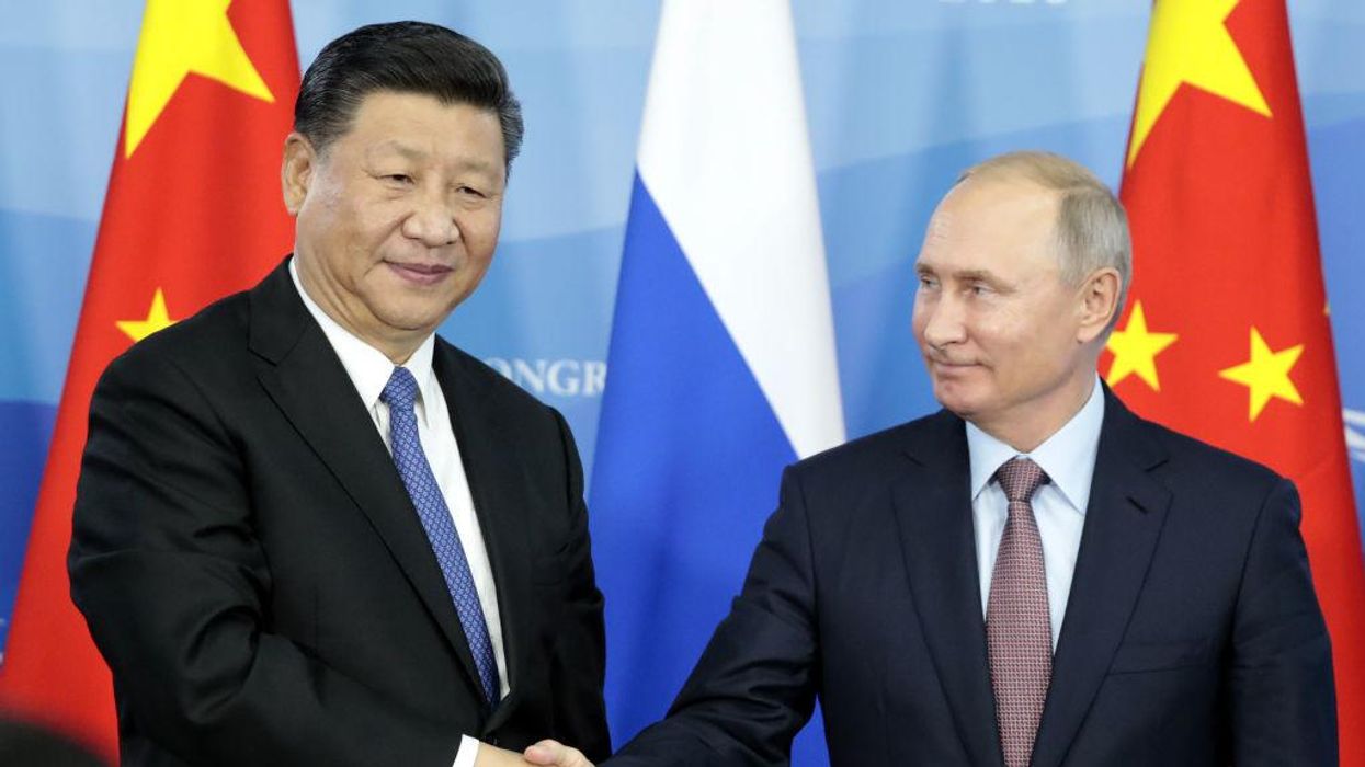 China provides rhetorical cover for Russia and their 'new model of international relations'