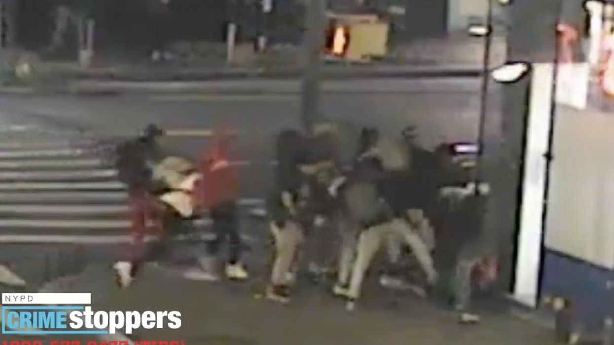 Vicious mob chases down, punches, kicks, stabs man following argument in Times Square food cart line