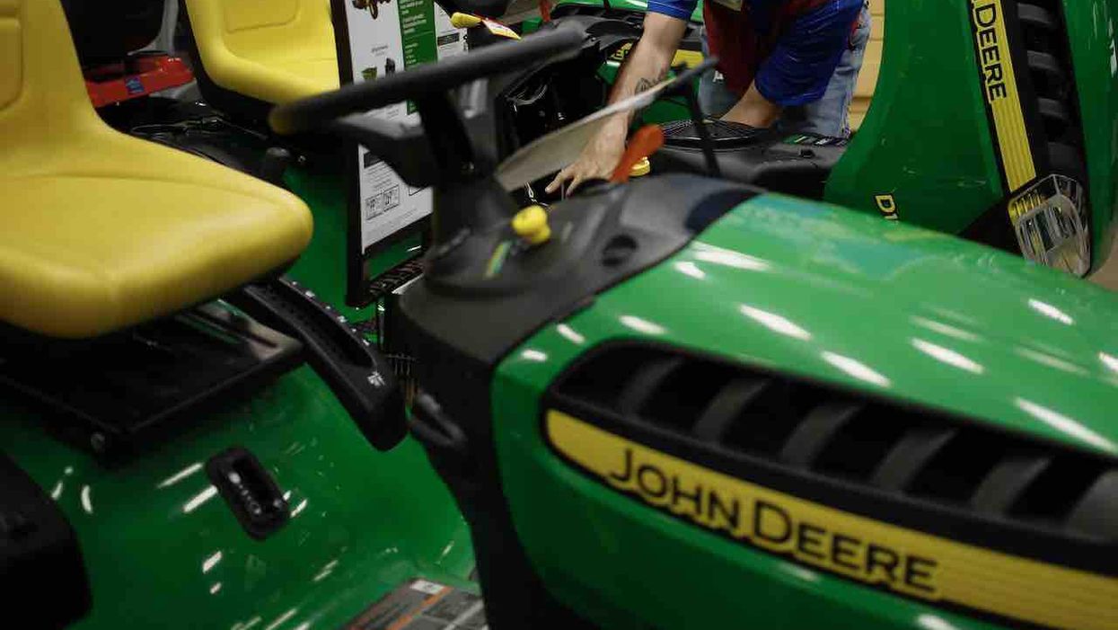 Naked man tackles 67-year-old woman off riding lawnmower. Victim's husband intervenes, but man attacks him, too — so husband shoots him dead.