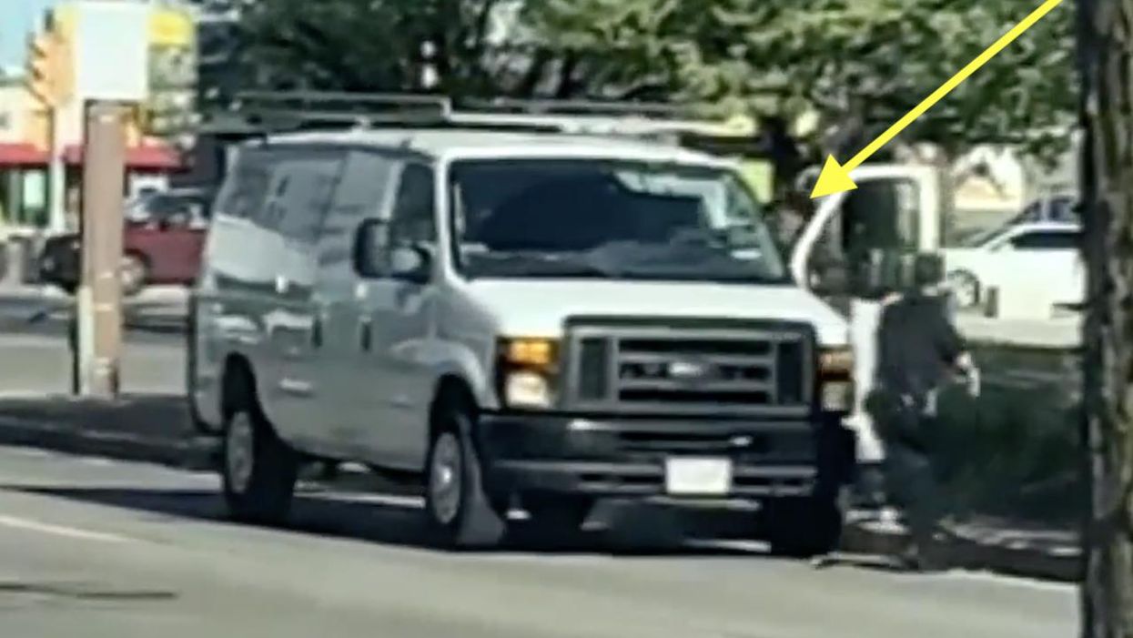 Video: Would-be carjacker on run from cops yanks open van door, grabs steering wheel — but driver fights back and literally kicks crook out