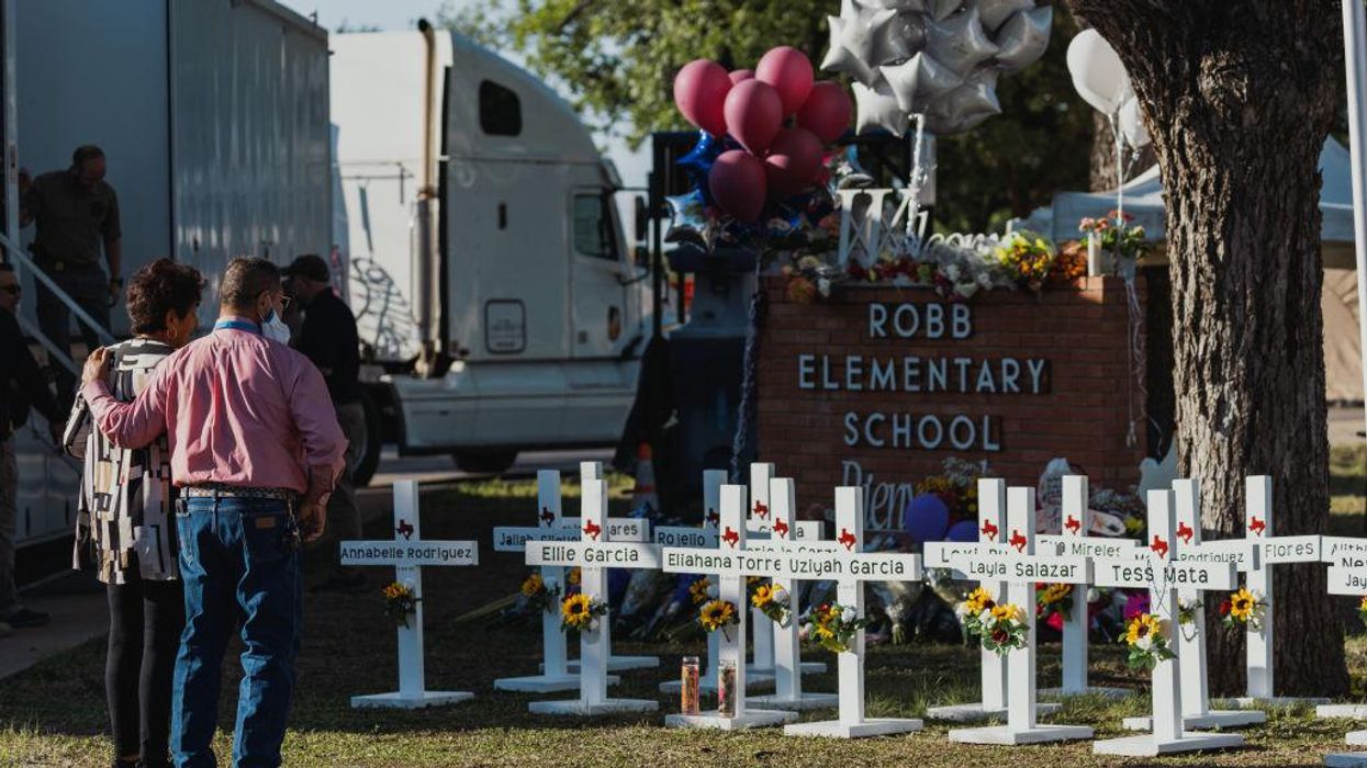 Questions mount as police now say Texas shooter entered Robb elementary 'unobstructed' through an unlocked door, an hour passed before border agents stormed the building