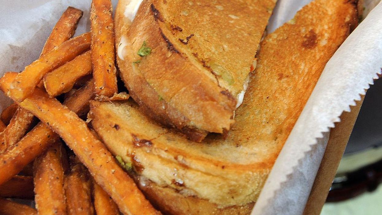 Canadian restaurant owners traded grilled cheese sandwiches for a painting that just sold for $272,548