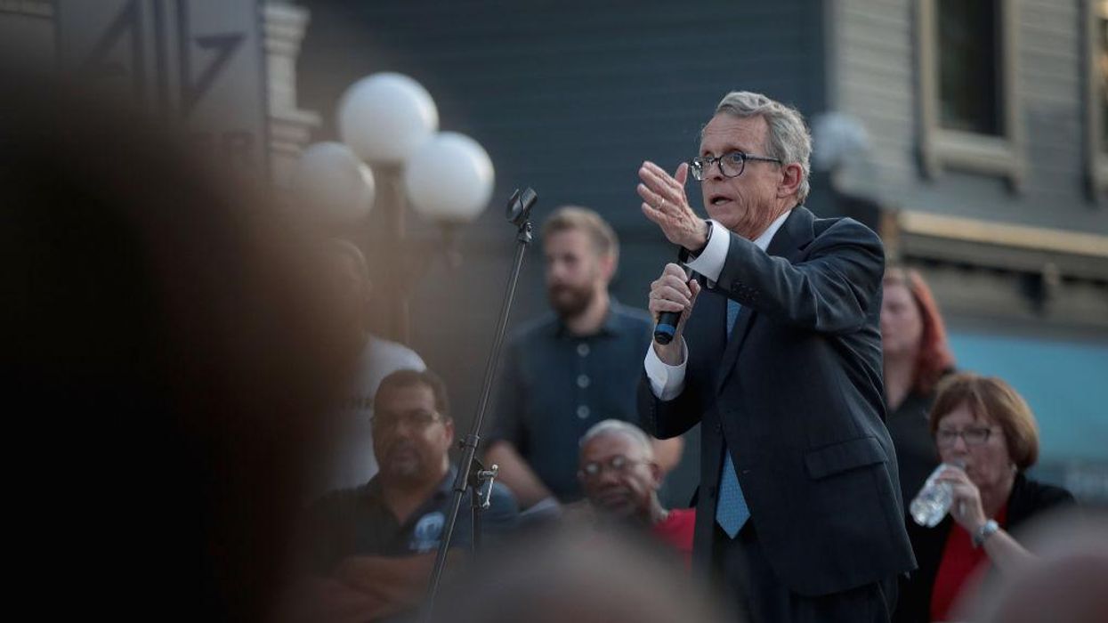 Ohio's Republican governor will sign a bill allowing school employees to carry guns