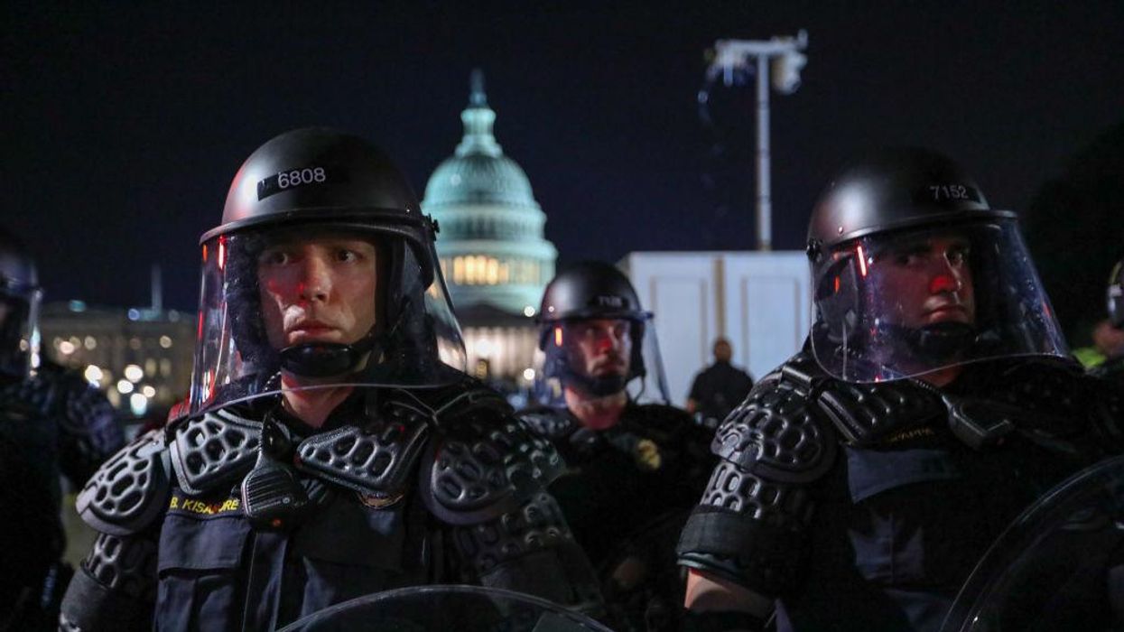 'Night of rage' protests erupt into violence across the country: Fox News HQ targeted, fireworks shot at police, pro-life woman attacked, journalists assaulted