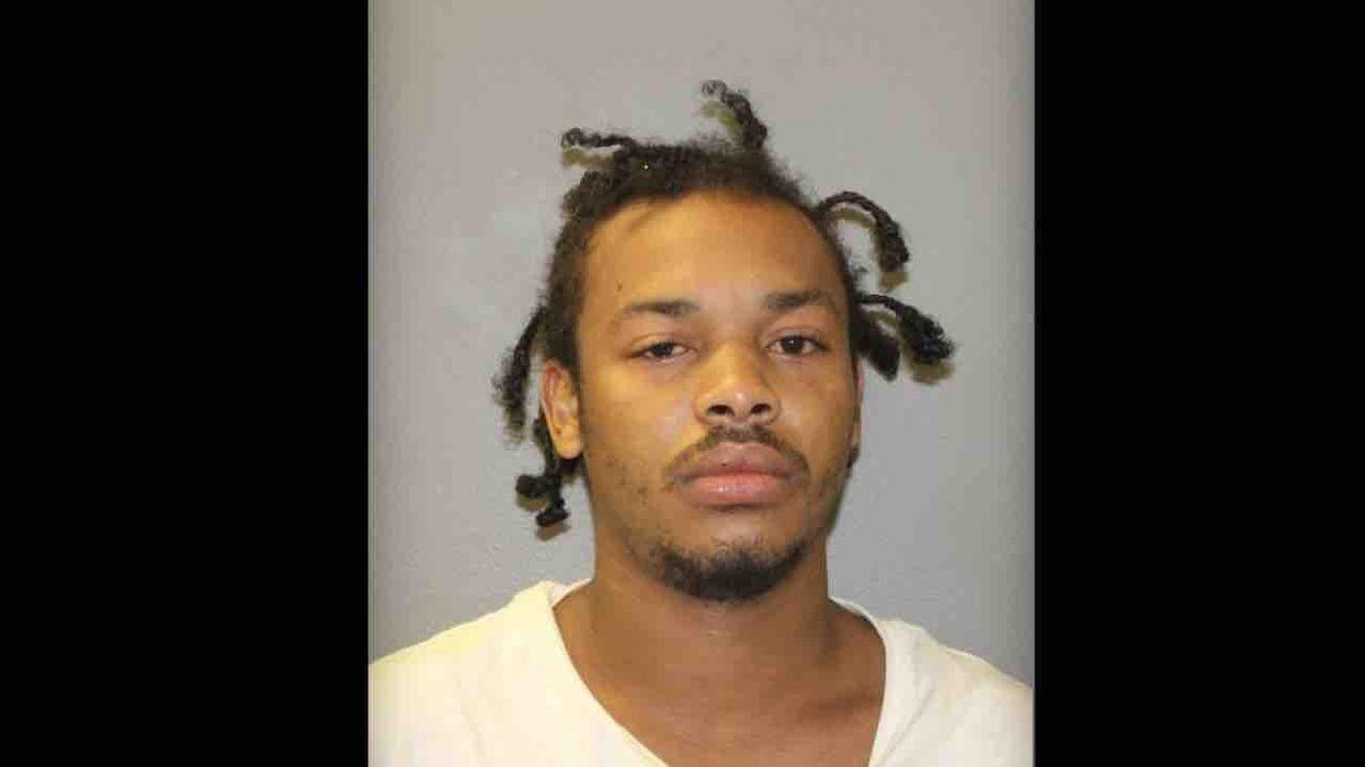 Man arrested after allegedly pointing gun at two women. Witness says suspect was upset women didn't say thank you after he held door open for them.
