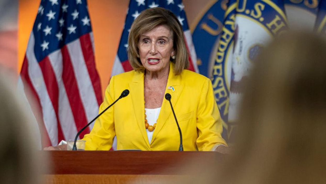 Reporter confronts Nancy Pelosi about husband's controversial stock purchases. Her reaction says it all.