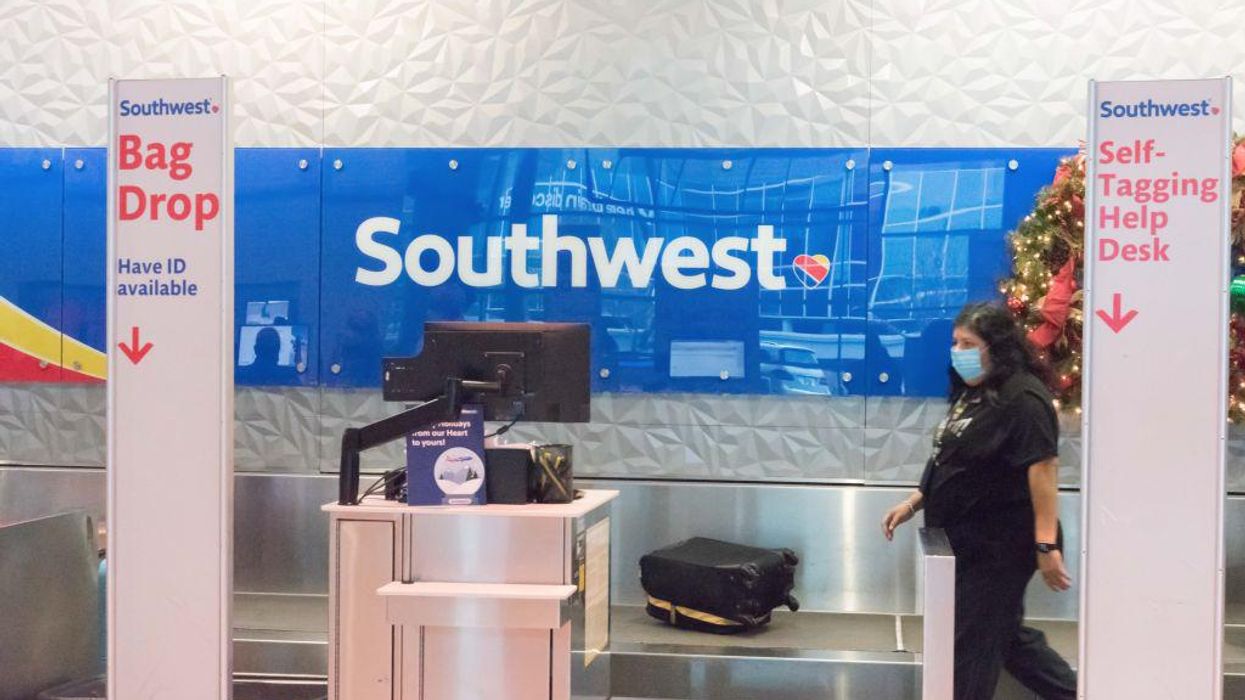 A woman fired a gun at Dallas Love Field airport. A police officer with a gun stopped her