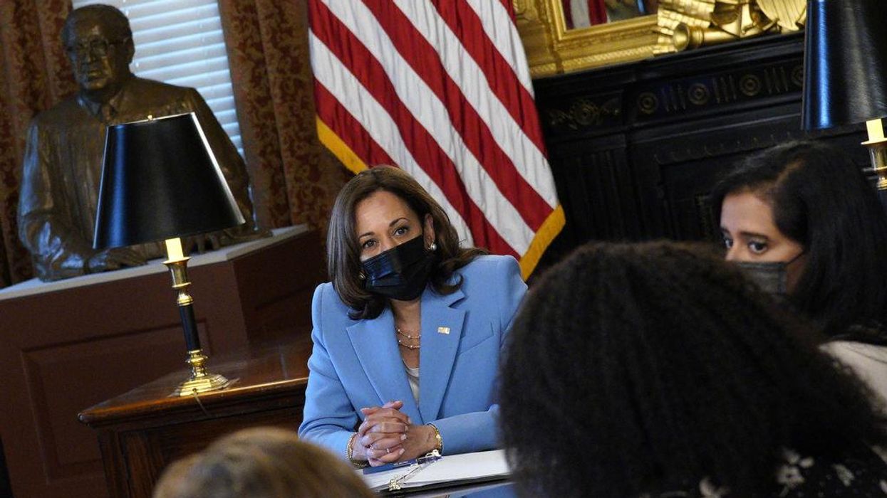 Vice President Harris announces her pronouns and provides a description of her attire at roundtable event