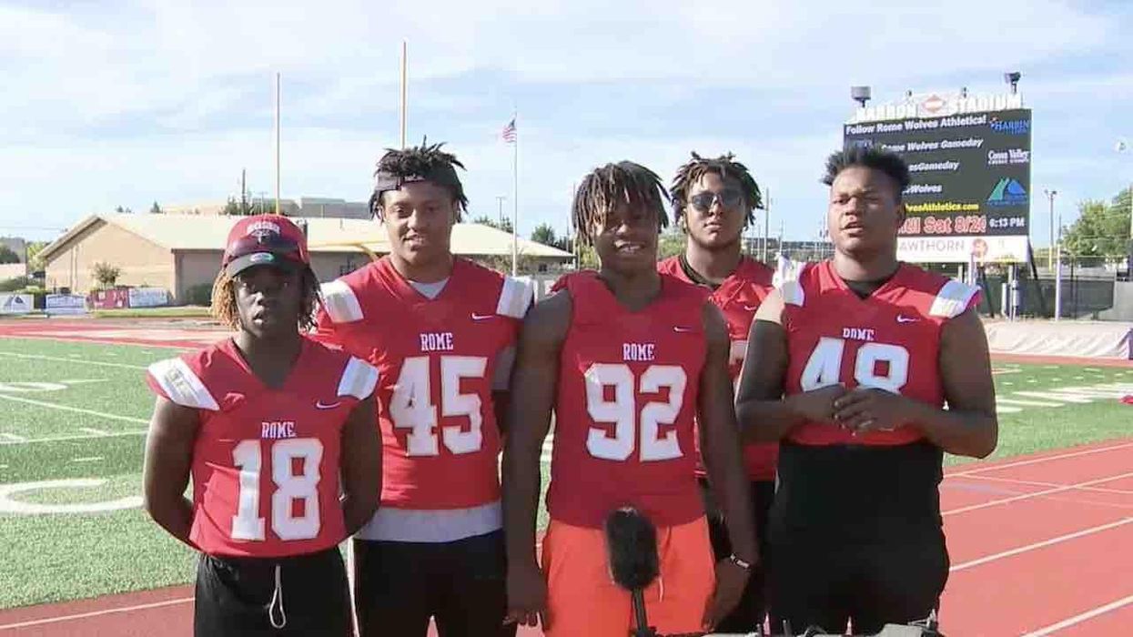 Heroic HS football players rush to wrecked car as smoke pours from hood — and rescue woman trapped inside: 'These kids really did run right into danger'