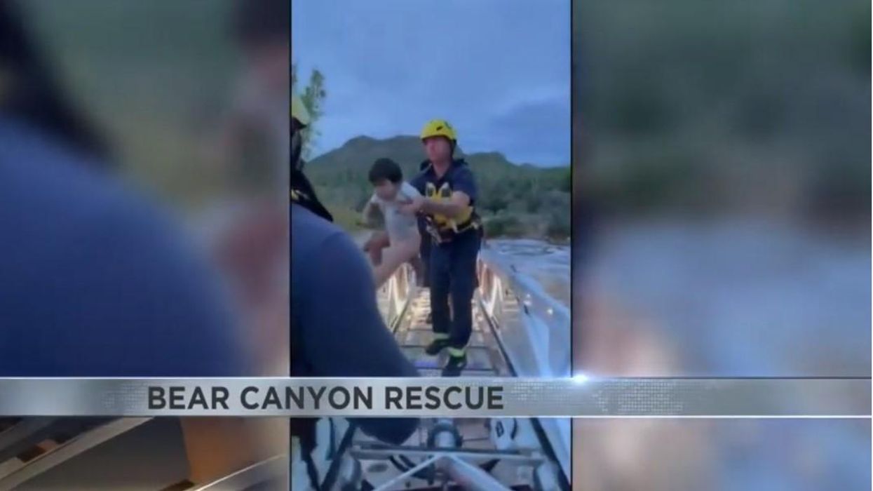 Rescue teams save 25 people stranded by flash flooding in national forest