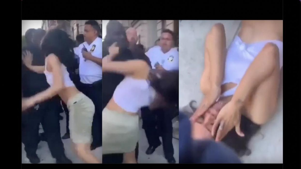 NYPD officer clobbers woman who appears to assault him, knocking her flat on her back. Police were arresting her boyfriend — an attempted murder suspect.