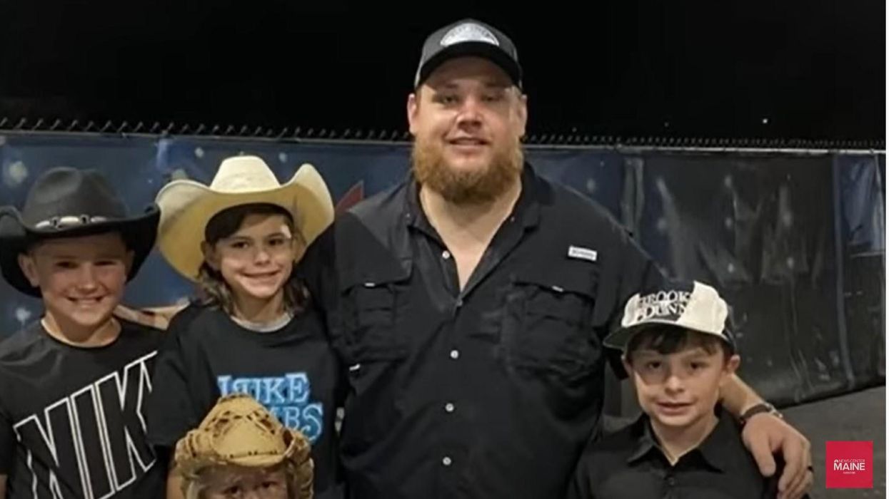 'Hard work pays off': 2 young fans chop wood to earn money for tickets to Luke Combs concert — and Combs pauses the performance to thank and reimburse them