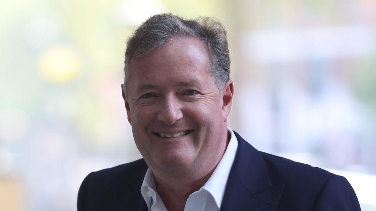 Piers Morgan calls the college professor who wished that Queen Elizabeth II's death would be agonizing 'a cowardly disgrace' for declining to accept his interview request