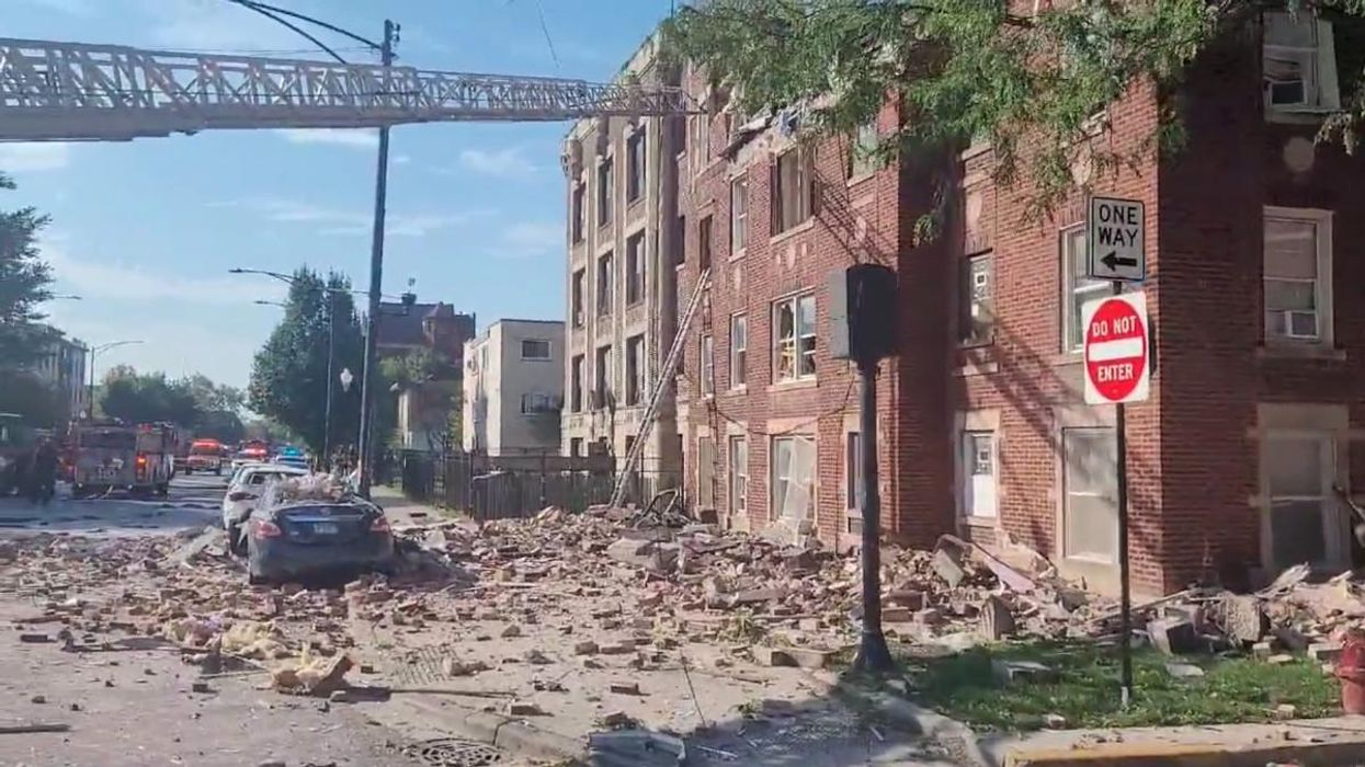 Eight hospitalized after explosion tears through top floor of Chicago apartment building