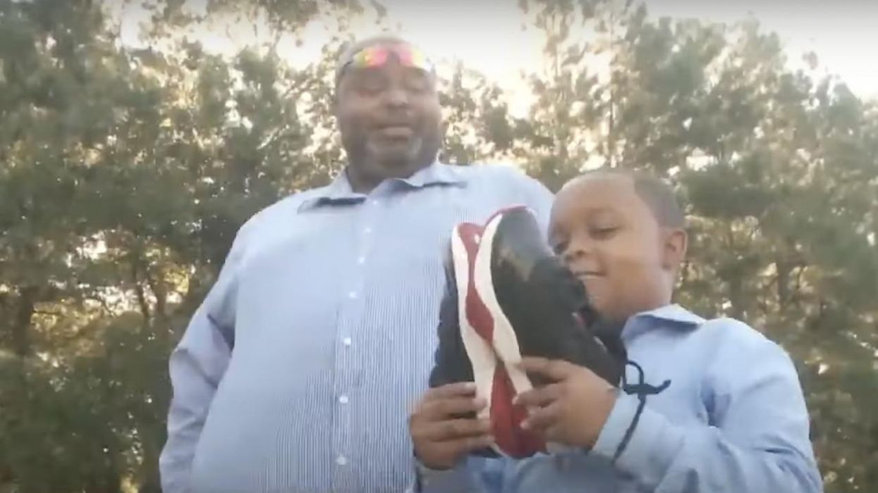 Shots ring out in mall, and one father reacts in a flash, covering up and protecting his young son — who's full of praise for his dad: 'He's better than Superman'