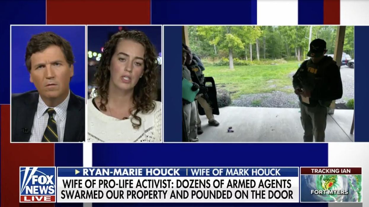 Wife of FBI-arrested pro-life activist tells Tucker Carlson her 7 children have been 'scared,' 'crying' since 25 agents with guns drawn showed up at their home