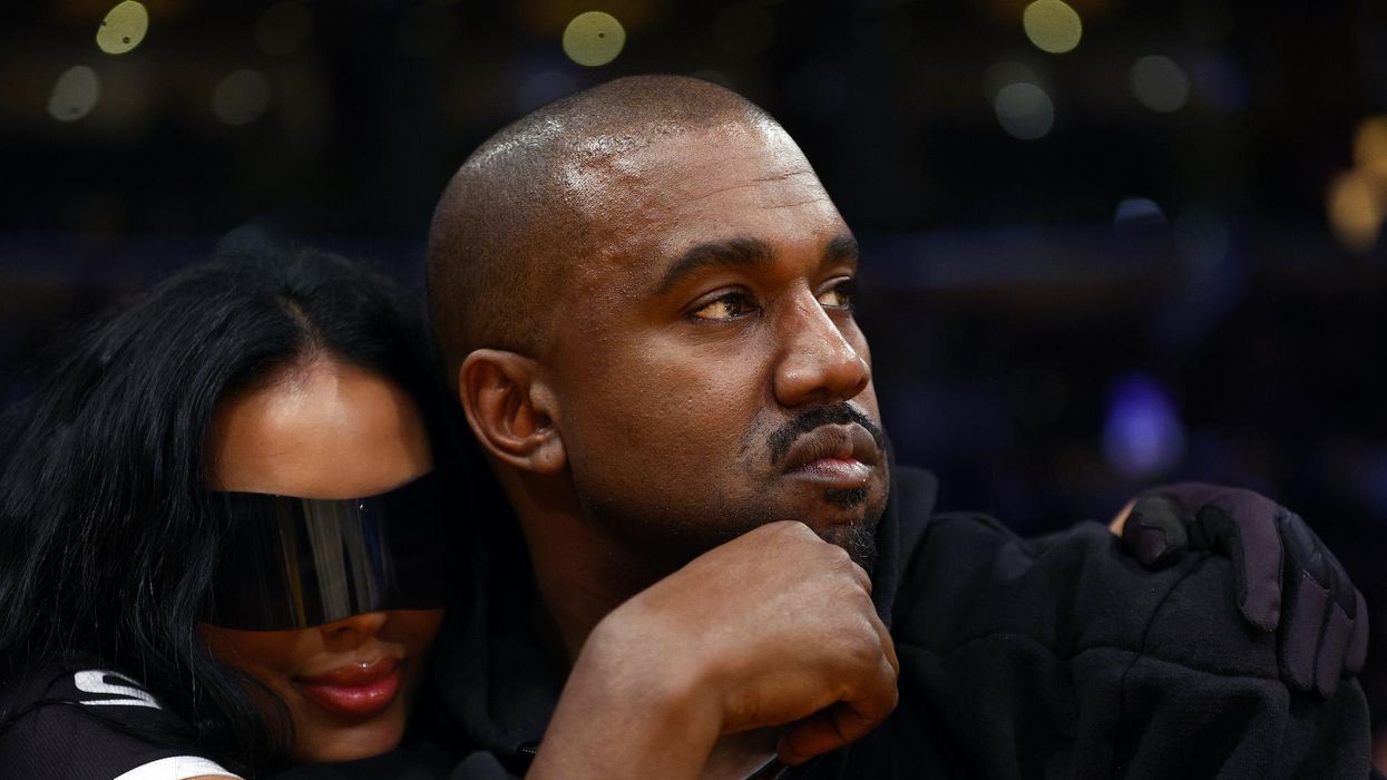 Outrage ensues after Kanye West wears 'White Lives Matter' design at surprise fashion show